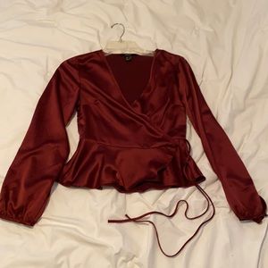 Blouse with tie-flapped detail on front